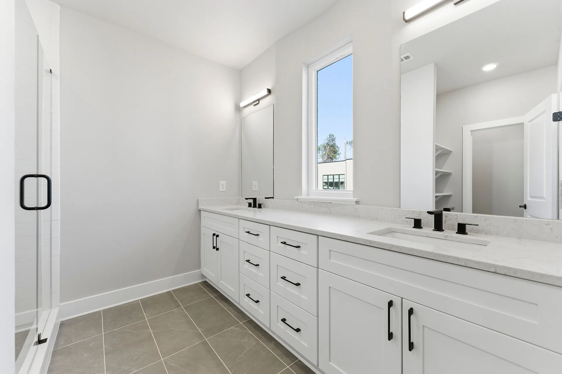 Primary bath, dark cabinetry