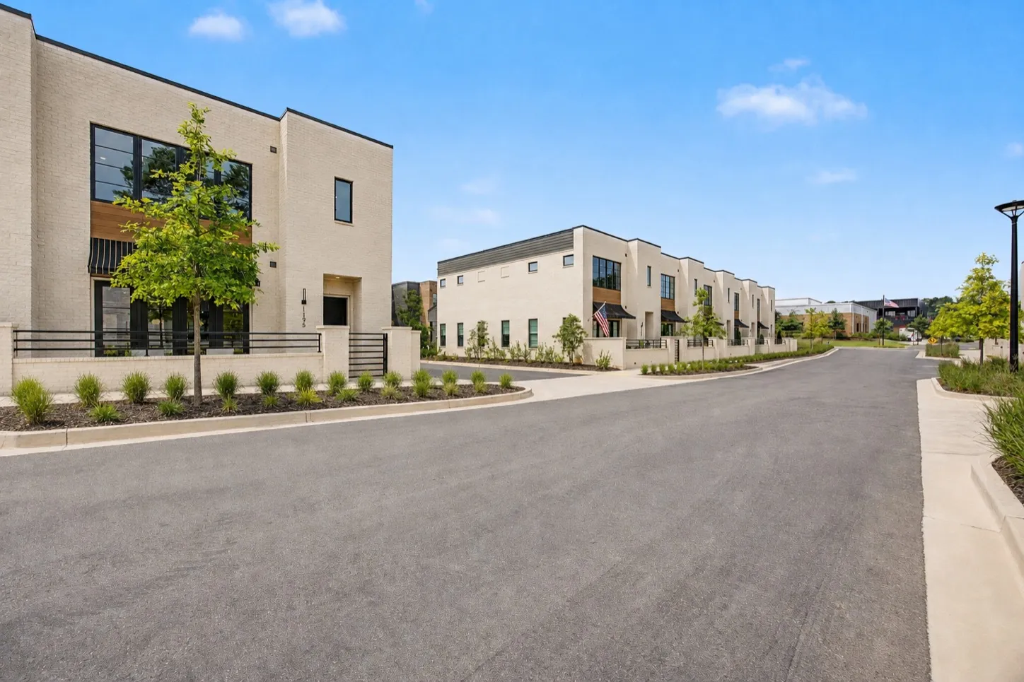 Exterior, townhome fronts along Watson Lane